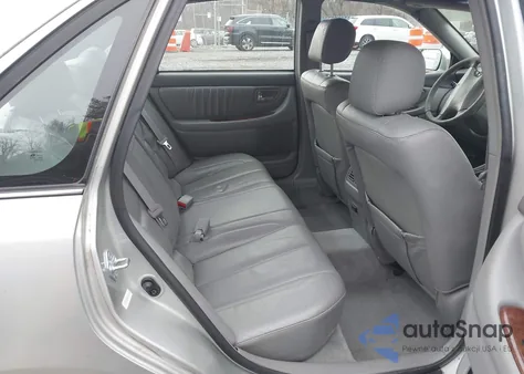 2001 Toyota Avalon Xls z USA, uszkodzony, nr VIN 4T1BF28B81U121468